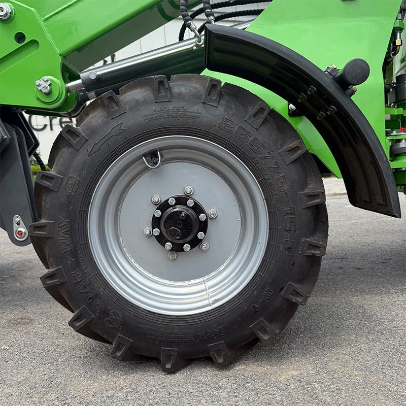 Electric front end loader for garden tractor